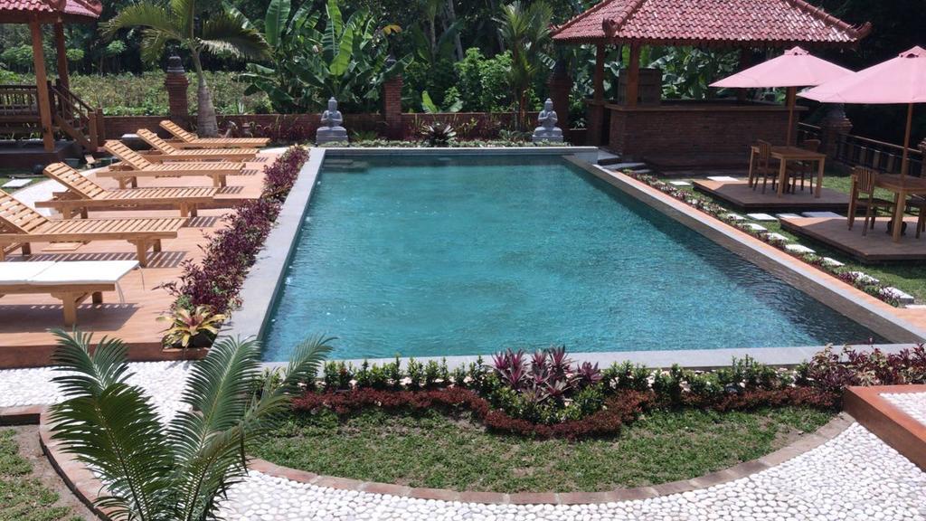Rumah Dharma 2 Riverside Hotel มาเกอลัง ภายนอก รูปภาพ
